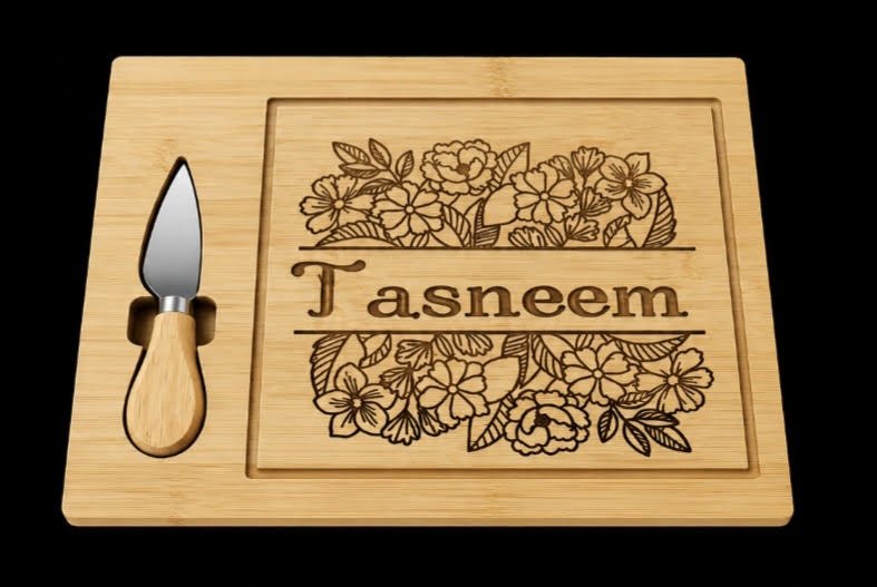 Engraved wooden cheese board with floral name plate reading Tasneem and matching cheese knife
