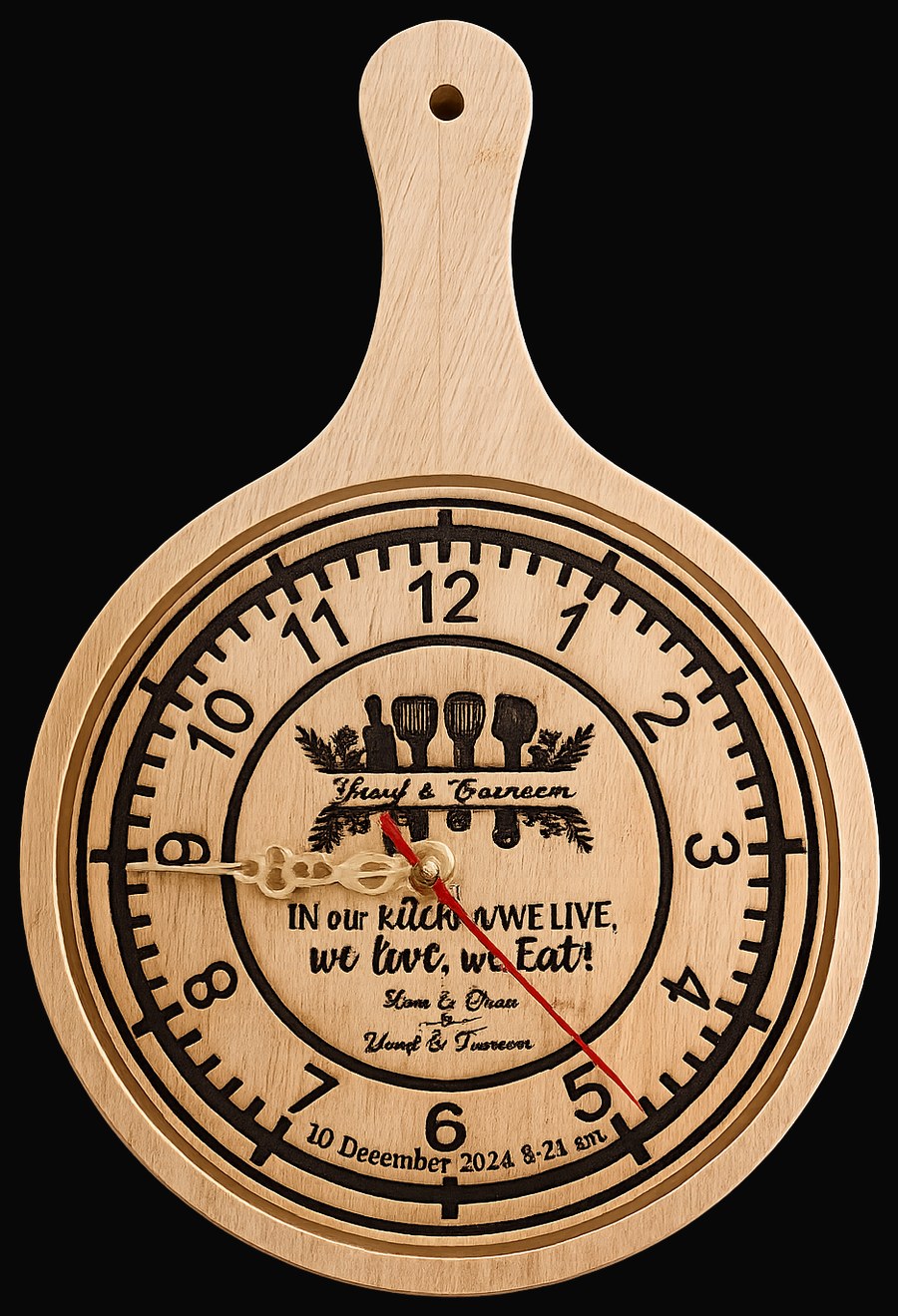 Engraved wooden paddle-shaped kitchen clock for Yusuf and Tasneem reading In our kitchen we live, we love, we eat